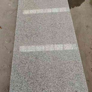 桂林芝麻白光面毛板