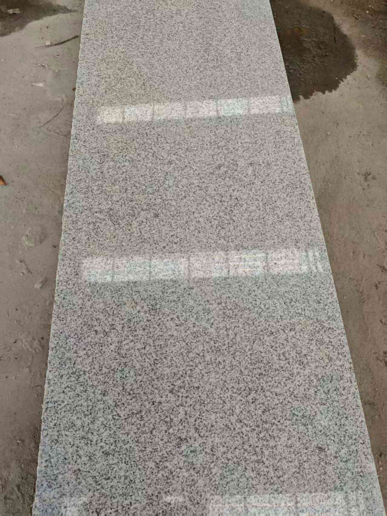 桂林芝麻白光面毛板